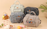 Collection of spacious bag for crochet projects in various floral prints with yarn accessories