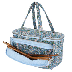 Blue floral knitting project bag with front pocket for crochet hooks